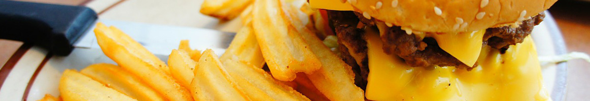 Eating Burger Fast Food at Kidd Valley restaurant in Kenmore, WA.